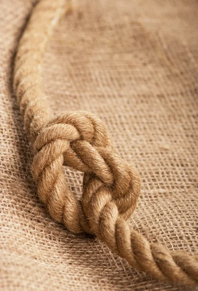 stock image Frame make from rope laying on jute