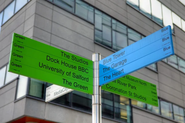 Direction signs at MediaCityUK, the new home for the BBC — Stock Photo, Image