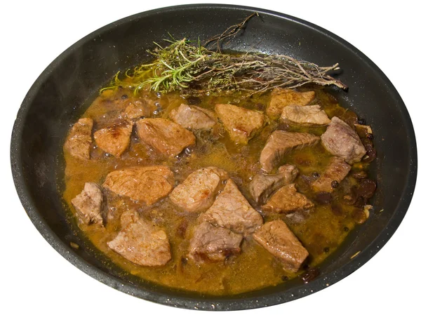 Vlees in een koekenpan, geïsoleerd — Stockfoto