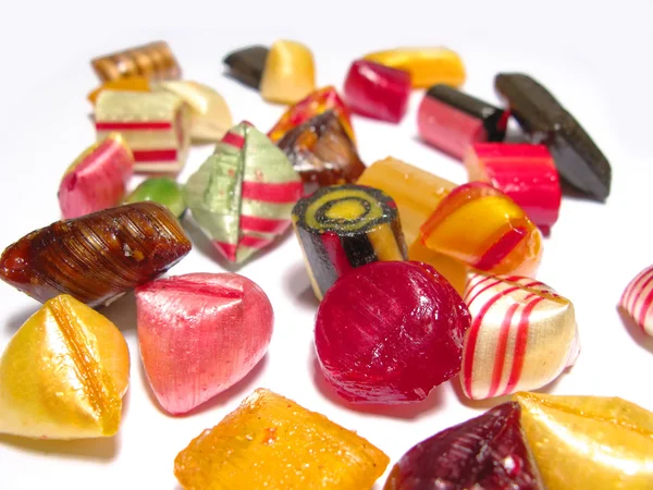 Різноманітні барвисті та ремісничі ізольовані цукерки — стокове фото