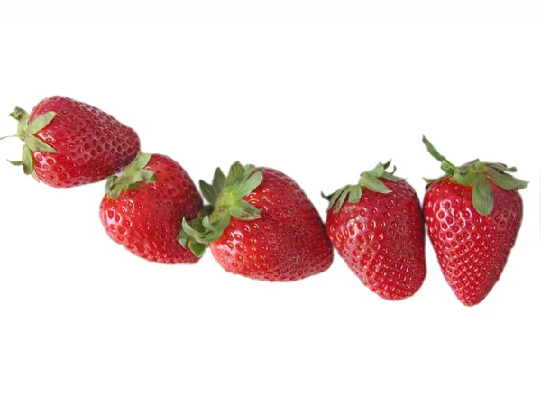 Rode en sappige aardbeien geïsoleerd in wit — Stockfoto