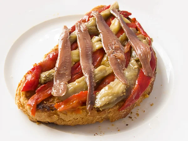 Pão com pimenta e anchovas — Fotografia de Stock