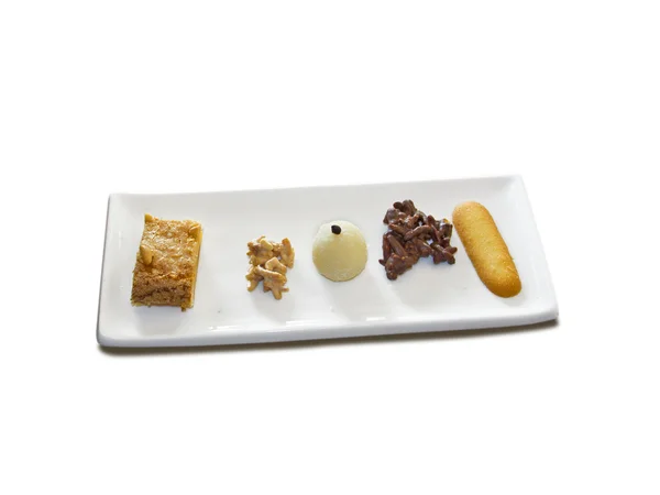 Variedad de pastelitos de buen gusto, que se muestran en un plato —  Fotos de Stock