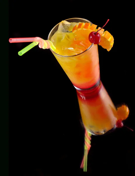 Orange cocktail with a cherry — Stock Photo, Image