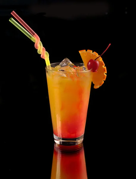 Orange cocktail with a cherry — Stock Photo, Image