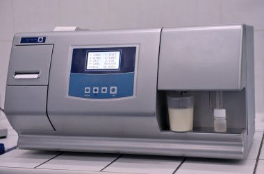 Laboratory equipment for testing dairy products clipart