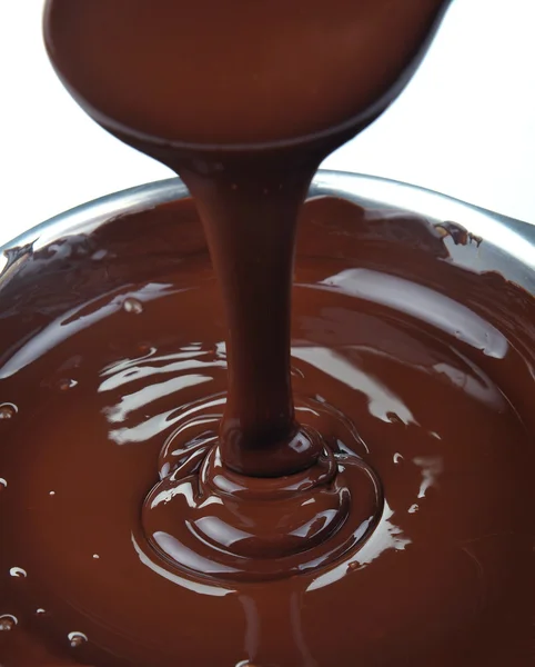 Veel chocolade vallen van bovenaf Rechtenvrije Stockfoto's