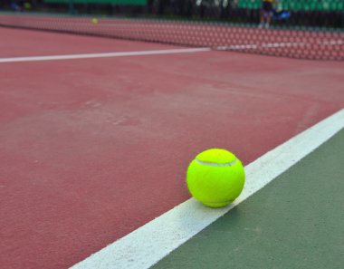 Tennis Balls shot on a outdoor tennis court clipart