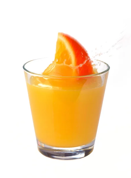 Orangensaft spritzt — Stockfoto