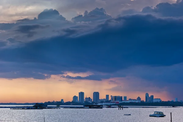 Sunset storm over Johor Bahru city in Malaysia Stock Picture