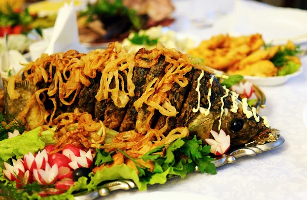 stock image Baked carp on a table at restaurant