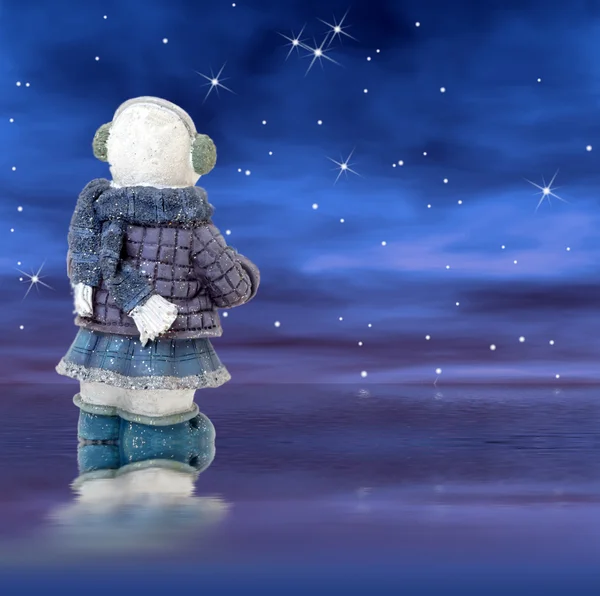 Muñeco de nieve en una noche estrellada —  Fotos de Stock