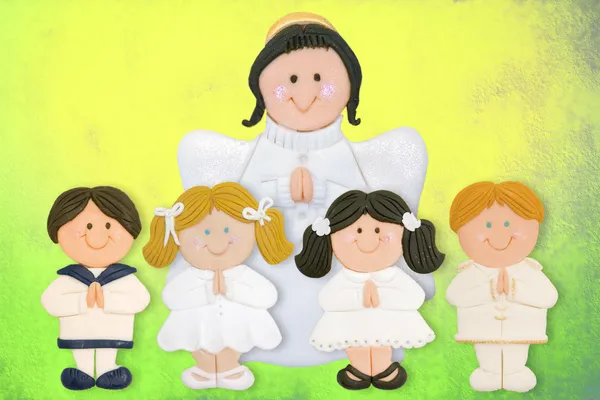 Cheerful first communion card, funny children with angel — Stock Photo, Image