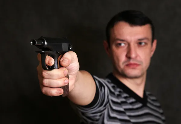 Az ember egy pisztoly — Stock Fotó