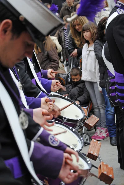 stock image GRANADA, ANDALUSIA, SPAIN - APRIL 6: Music band the penitents of the brotherhood in typical procession Holy Week in April 6, 2012 in Granada, Andalusia, Spain