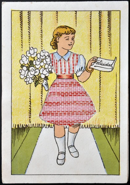 ИСПАНИЯ - CIRCA 1958: На открытке, напечатанной в Испании, изображена молодая женщина с букетом цветов и запиской со словом "счастье", примерно 1958 г. — стоковое фото