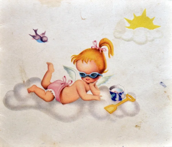 ESPANHA - CIRCA 1957: Um postal impresso na Espanha mostra um anjo bebê em uma nuvem, por volta de 1957 — Fotografia de Stock