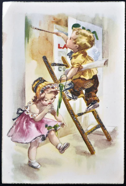 ESPANHA - CIRCA 1959: Um cartão postal impresso na Espanha mostra uma criança pintando a parede, enquanto o balde de tinta derrama sobre o vestido de uma menina, por volta de 1959 — Fotografia de Stock