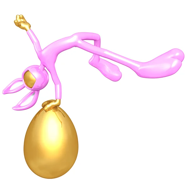 Osterhase mit goldenem Ei — Stockfoto