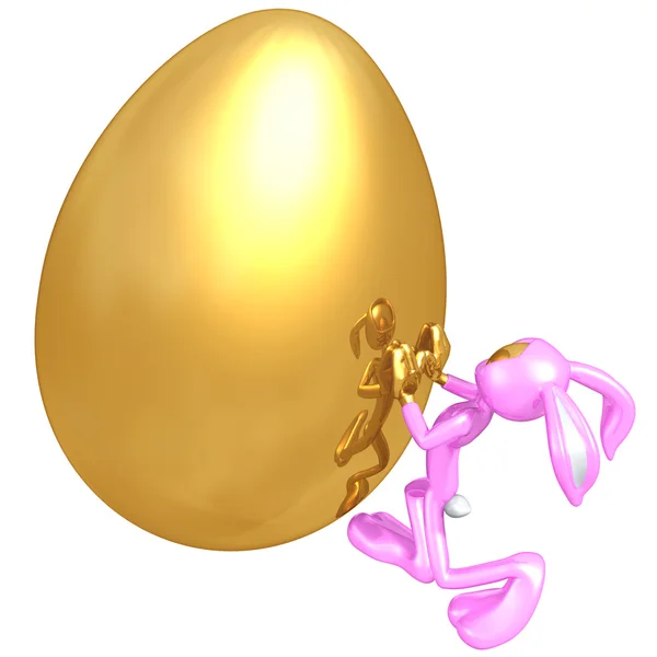 Coelhinho da Páscoa Empurrando Ovo de Páscoa de Ouro Gigante — Fotografia de Stock