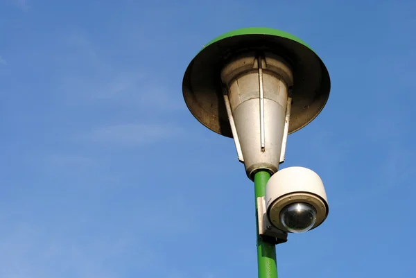 stock image Speed dome on a green street lamp