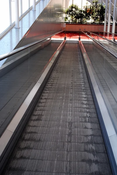 stock image Modern passenger conveyors, inclined moving walk