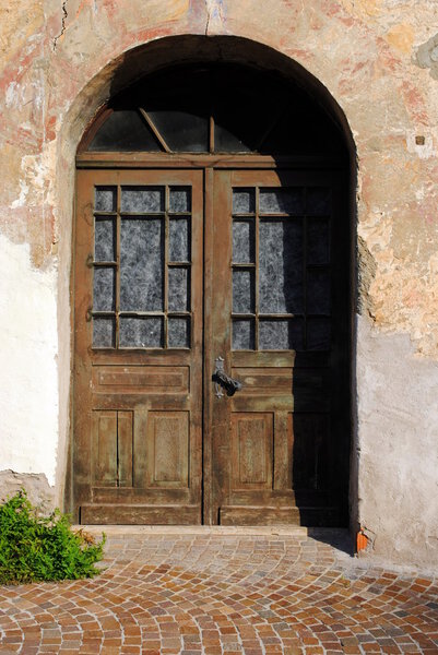 Old door made of wood, iron and glass