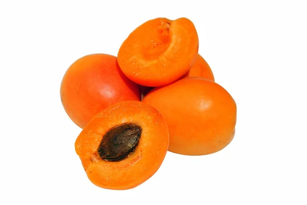 Whole and half apricots isolated on white — Stock Photo, Image