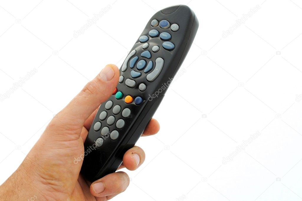 Man hand holds a remote controller, isolated on white background