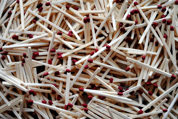 Wooden matches with red head as background — Stock Photo, Image