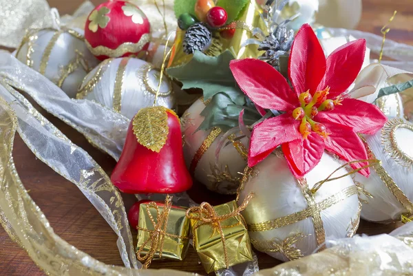 Poinsettia and bell — Stock Photo, Image
