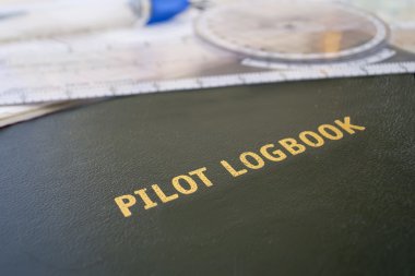Aviator logbook and tools clipart