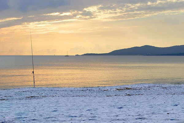Рибальський стрижень на заході сонця — стокове фото