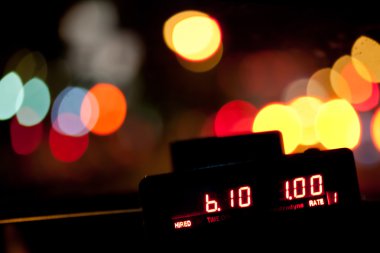 Taximeter in the night clipart