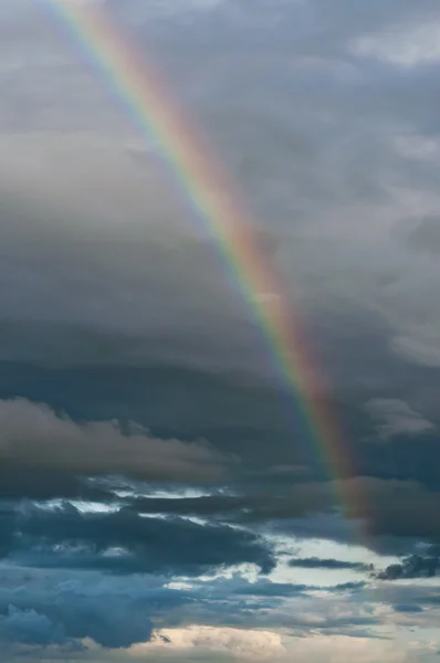 stock image Rainbow on a cloudy sky.