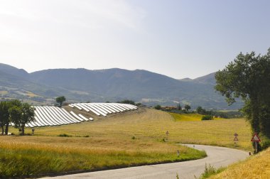 Landscape in Marches with solar panels clipart