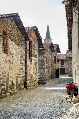 Ricetto of Candelo (Italy) with bicycle clipart