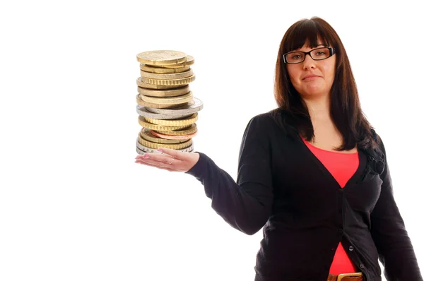 Mujer sosteniendo una pila de monedas — Foto de Stock