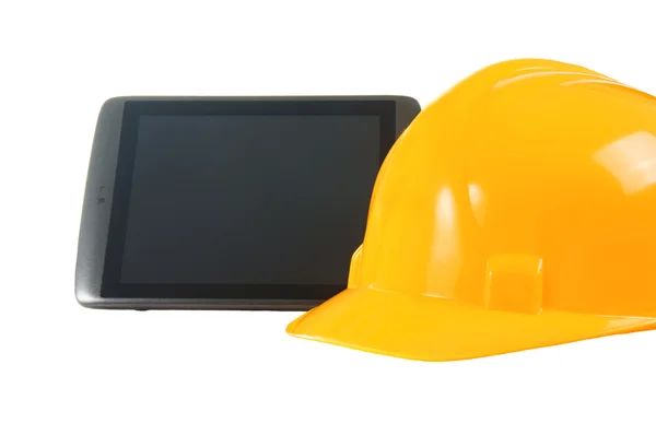 Tablet Pc and helmet — Stock Photo, Image