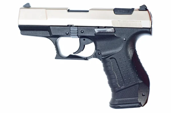 Пистолет над белым — стоковое фото
