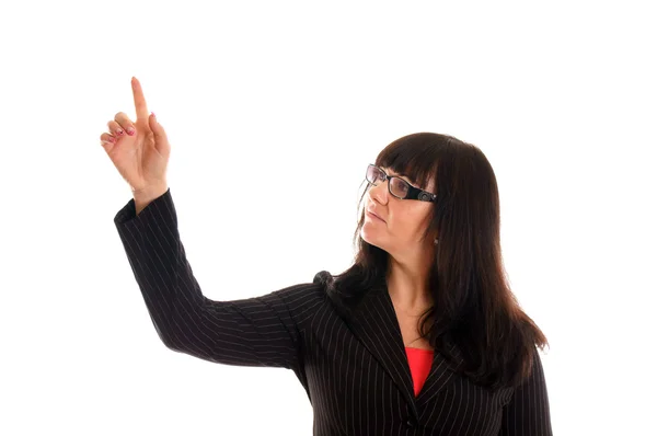 Jovem mulher apontando um dedo para cima — Fotografia de Stock