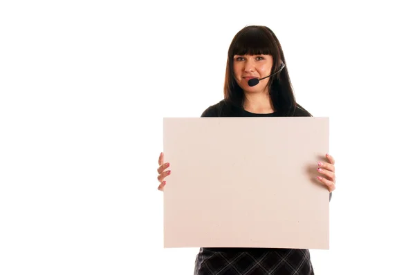 Νεαρή γυναίκα με το ακουστικό και άδειο διαφημιστική πινακίδα — Φωτογραφία Αρχείου