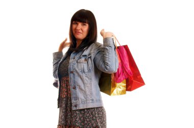 Attractive young girl with shopping bags clipart