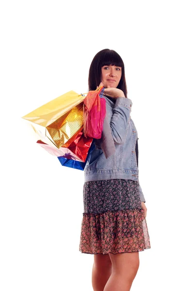 Muchacha joven atractiva con bolsas de compras —  Fotos de Stock