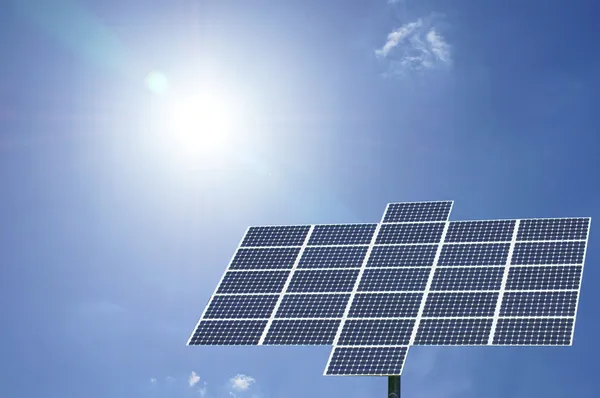 Solar panel with sun and blue sky — Stock Photo, Image