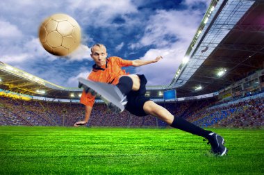 Football player on field of stadium clipart