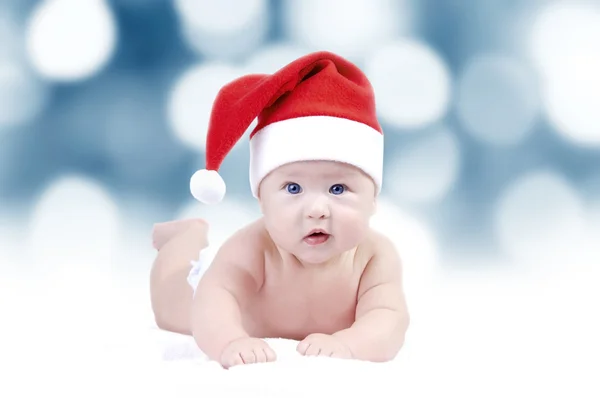 Bambino a Capodanno cappello sullo sfondo bokeh — Foto Stock