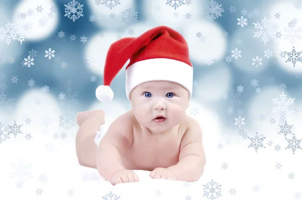 Baby in nieuwe jaar hoed op de achtergrond bokeh — Stockfoto