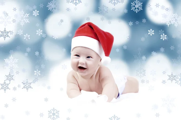 Bambino a Capodanno cappello sullo sfondo bokeh — Foto Stock