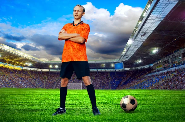 Football player on field of stadium — Stock Photo, Image